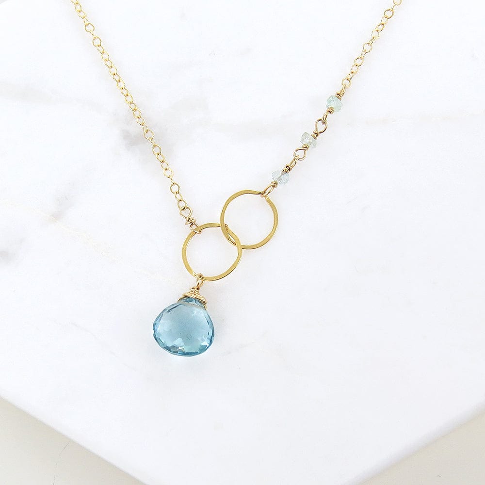 
                      
                        NKL-GF BLUE TOPAZ AND LOOPED GOLD NECKLACE
                      
                    