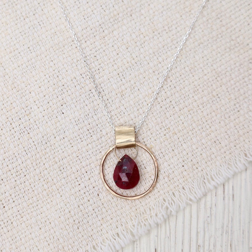 
                      
                        NKL-GF Circle Pendant with Ruby
                      
                    