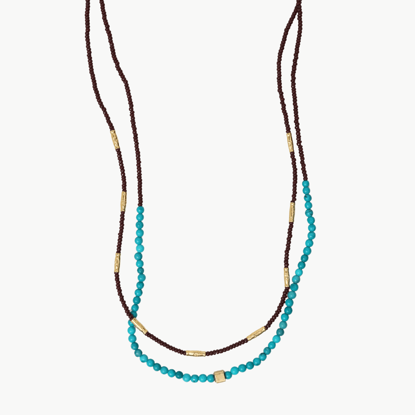 NKL-GF Dark brown seed with large turquoise section  & go