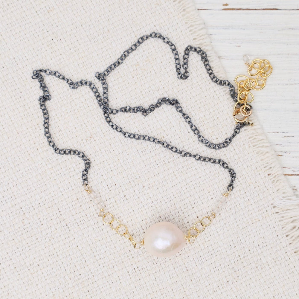 
                  
                    NKL-GF Edison pearl, quartz, oxidized silver & gold fill
                  
                