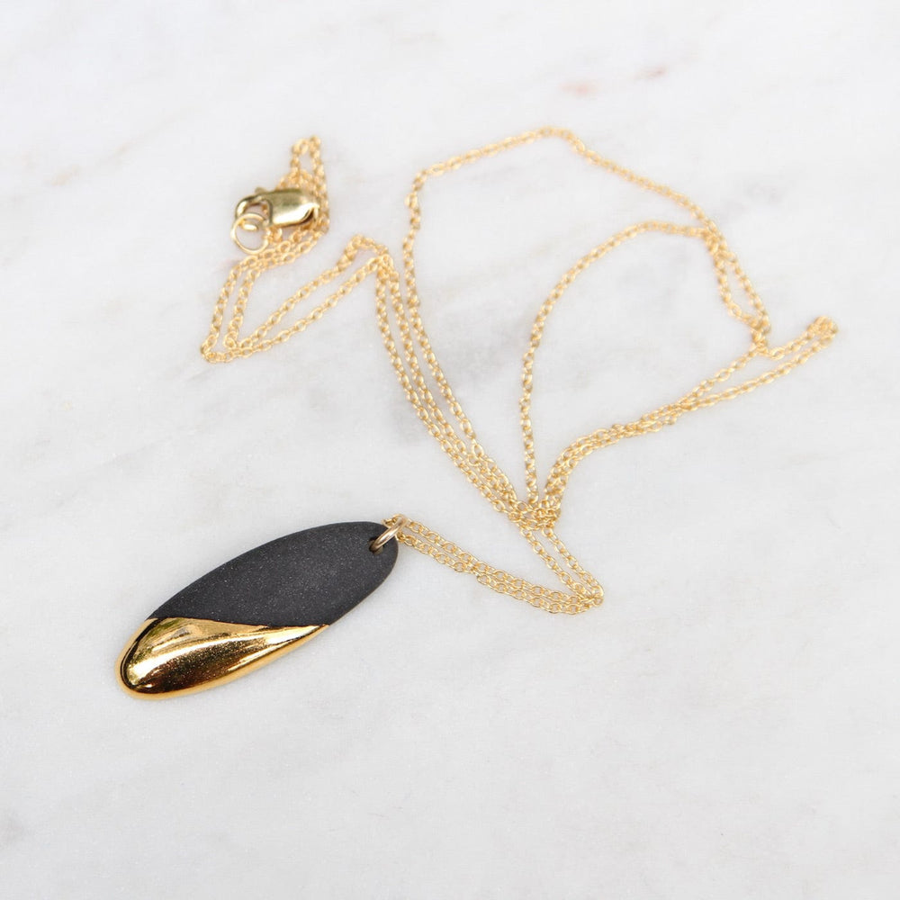 
                      
                        NKL-GF Gold Dipped Long Oval Necklace - Black
                      
                    