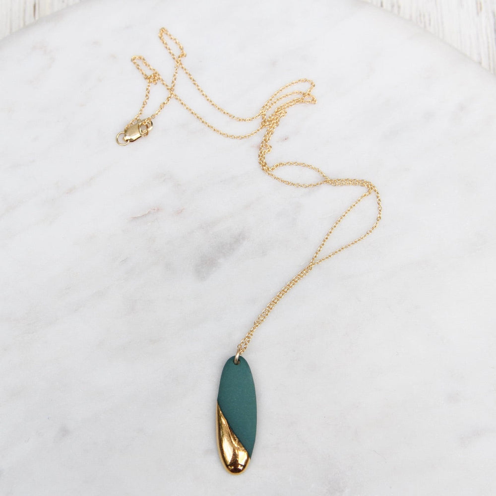 
                      
                        NKL-GF Gold Dipped Long Oval Necklace - Teal
                      
                    