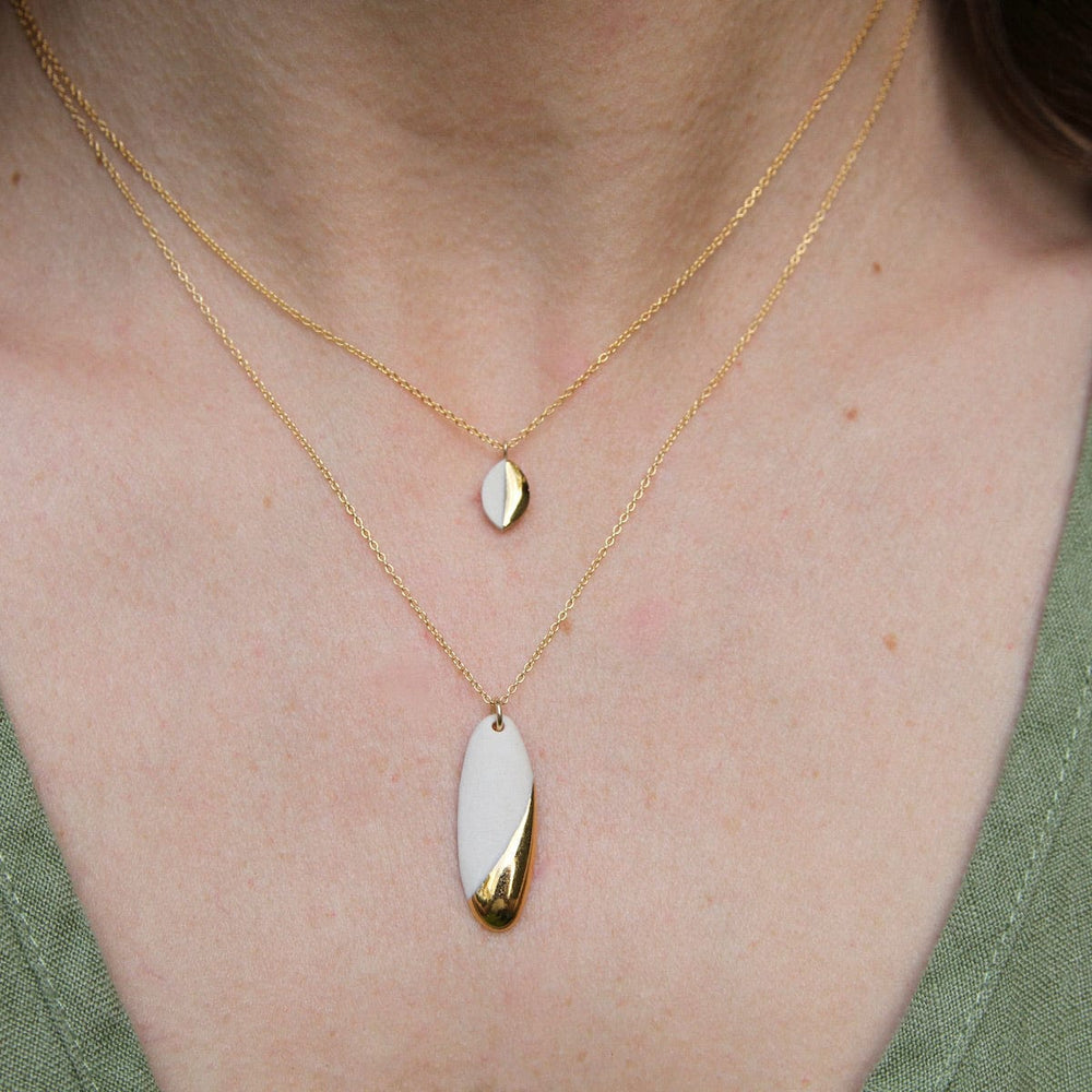 
                  
                    NKL-GF Gold Dipped Long Oval Necklace - White
                  
                