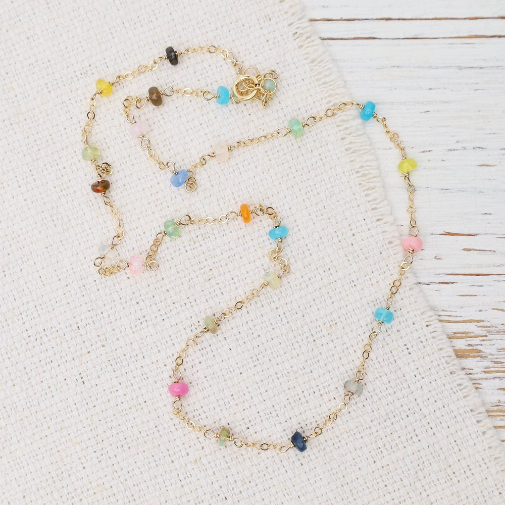 
                  
                    NKL-GF Gold Filled Cable Chain Dotted with Rainbow Opals
                  
                