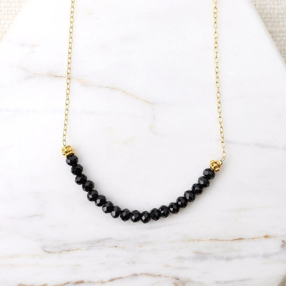 
                      
                        NKL-GF Gold Filled Chain with Gemstone Arc - Black Spinel
                      
                    