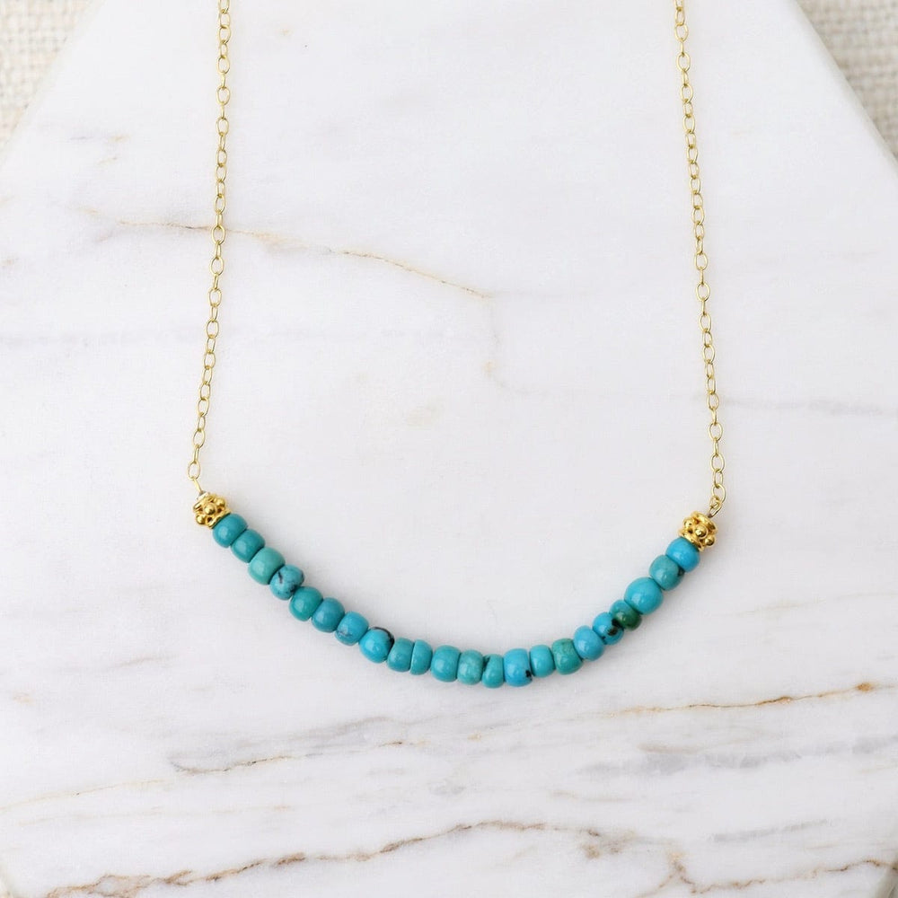 
                      
                        NKL-GF Gold Filled Chain with Gemstone Arc - Turquoise
                      
                    