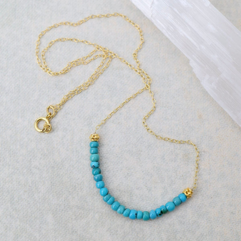 
                      
                        NKL-GF Gold Filled Chain with Gemstone Arc - Turquoise
                      
                    