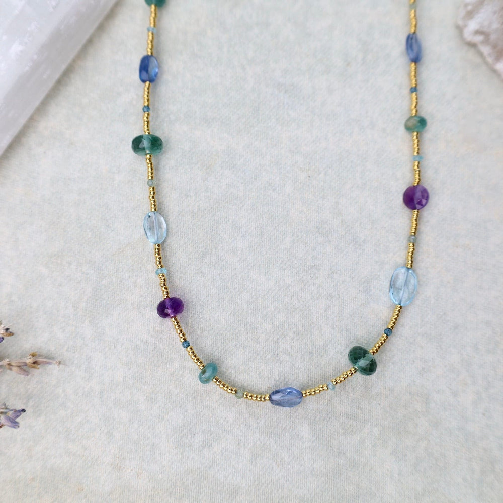 
                      
                        NKL-GF Gold glass, Amethyst, Grandidierite, & Blue Gemstone Necklace
                      
                    