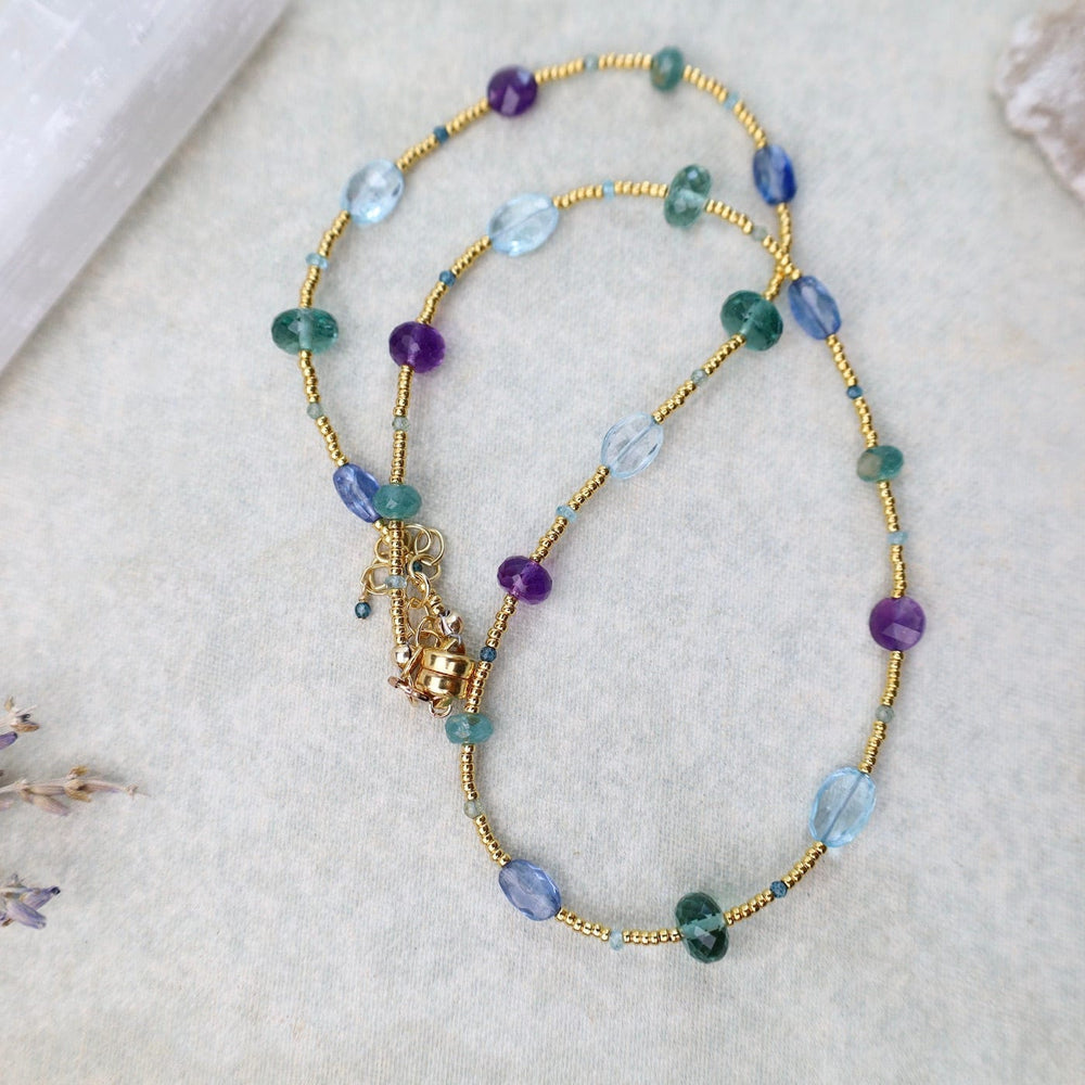 
                      
                        NKL-GF Gold glass, Amethyst, Grandidierite, & Blue Gemstone Necklace
                      
                    