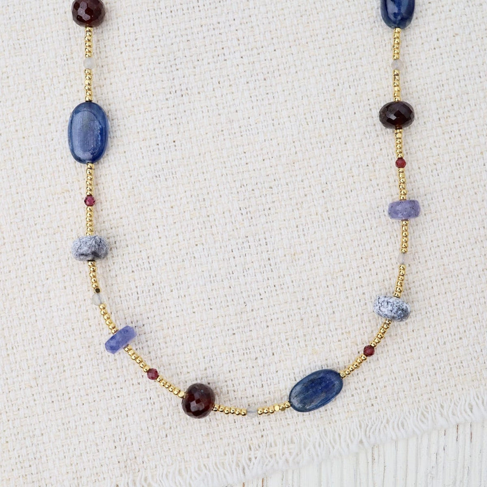 
                      
                        NKL-GF Gold glass, dendritic opal, garnet, tanzanite, kya
                      
                    