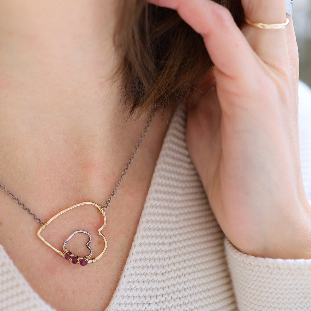 
                  
                    NKL-GF Gold & Silver Heart with Rhodolite Garnet Necklace
                  
                