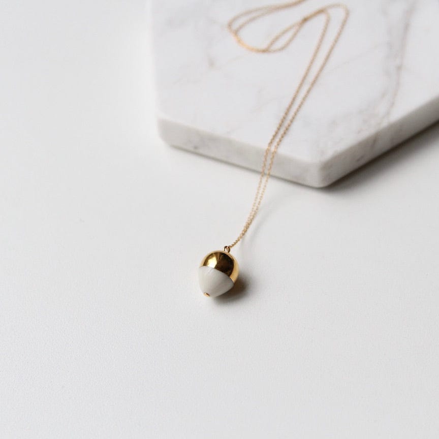 
                  
                    NKL-GF Gold & White Acorn Necklace
                  
                