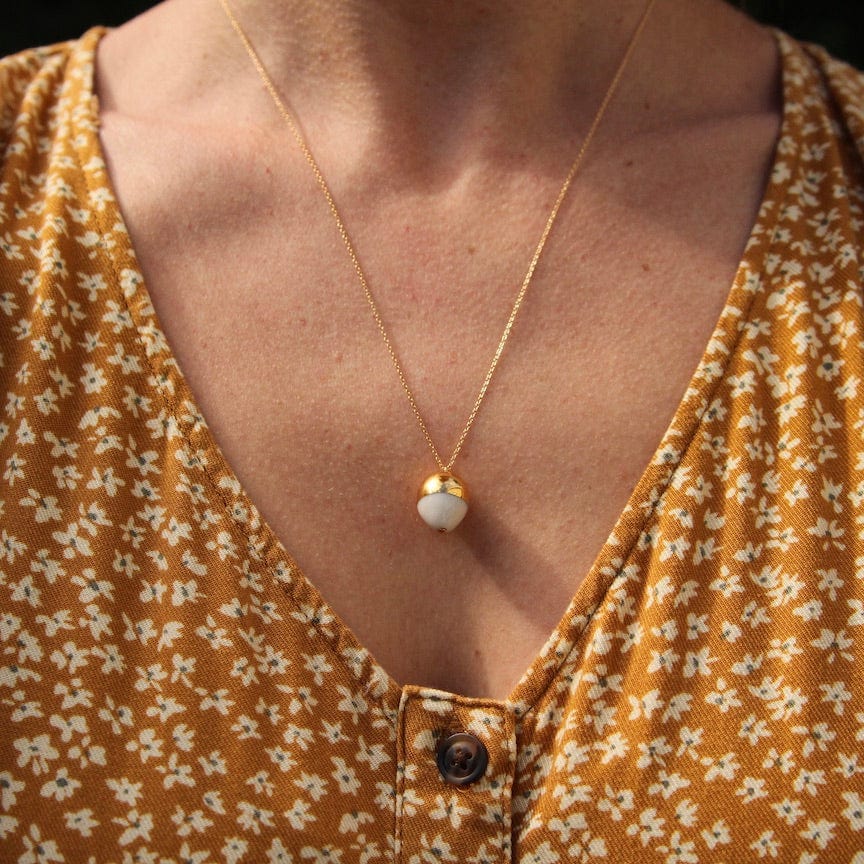 
                  
                    NKL-GF Gold & White Acorn Necklace
                  
                