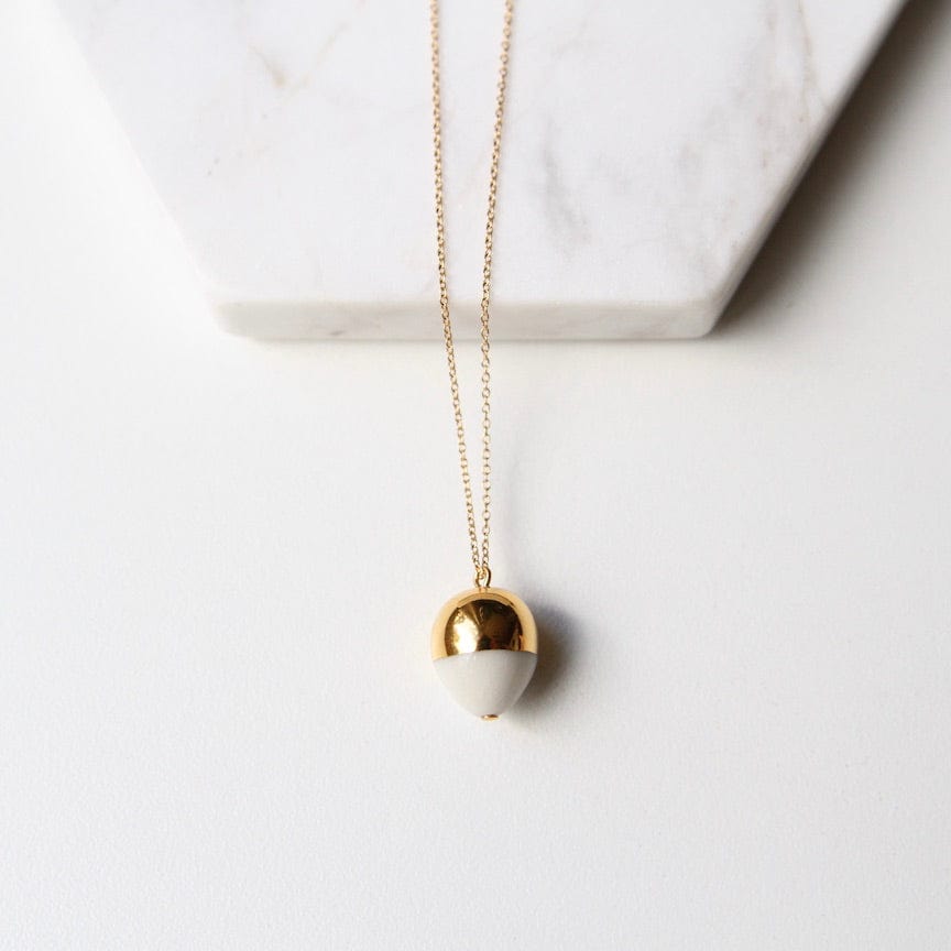
                  
                    NKL-GF Gold & White Acorn Necklace
                  
                