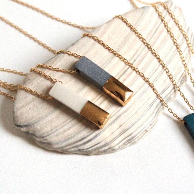 
                      
                        NKL-GF Grey Gold Dipped Bar Necklace
                      
                    