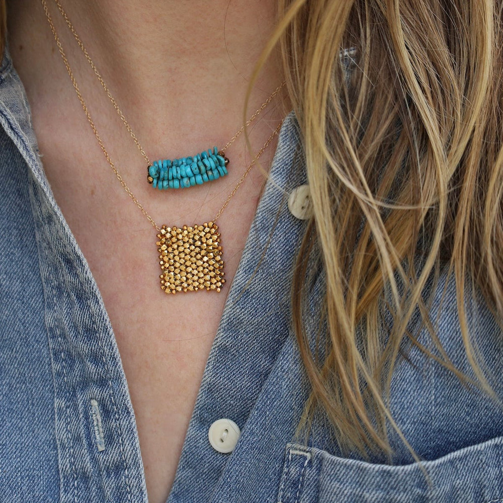 
                      
                        NKL-GF Hand Stitched Arizona Turquoise with Vermeil Trim
                      
                    