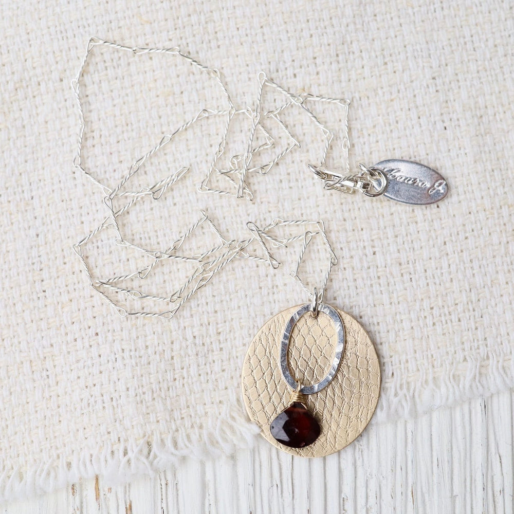 
                      
                        NKL-GF Layered Disk and Garnet Necklace
                      
                    