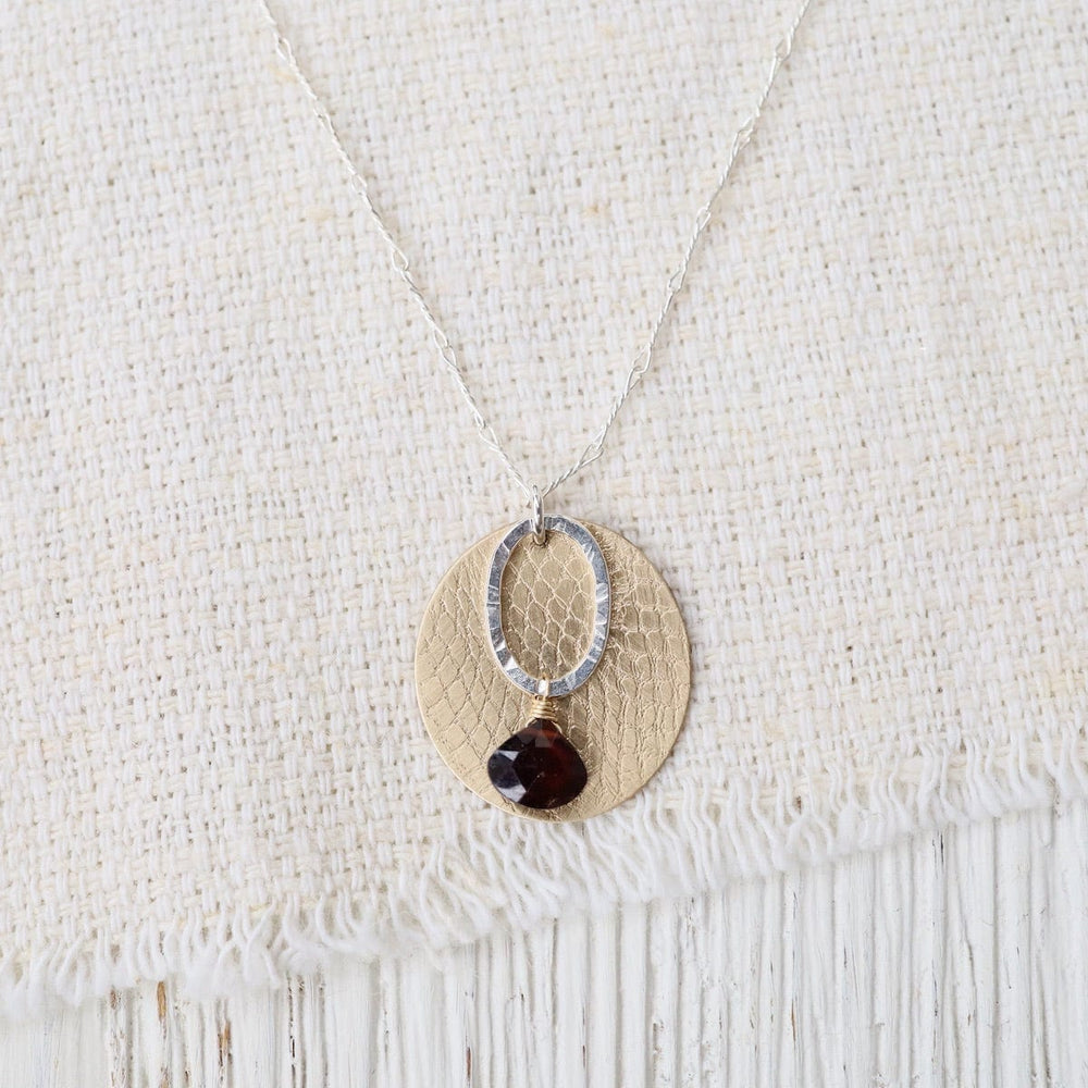 
                      
                        NKL-GF Layered Disk and Garnet Necklace
                      
                    