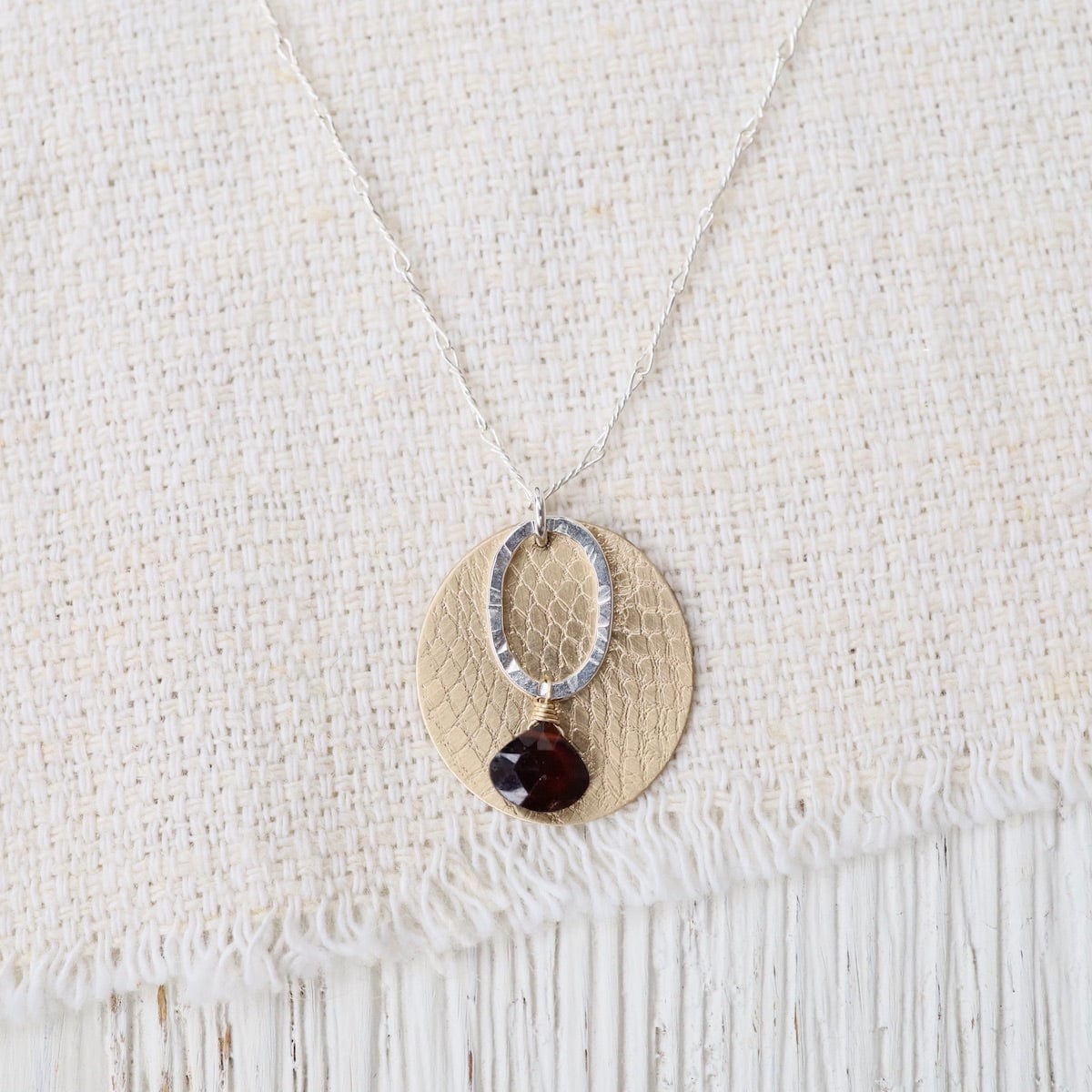 NKL-GF Layered Disk and Garnet Necklace