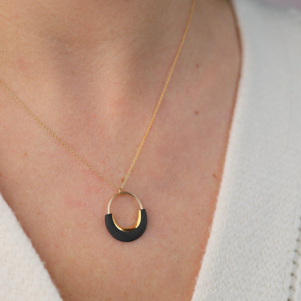 
                      
                        NKL-GF Matte Black Eden Round Nekclace
                      
                    