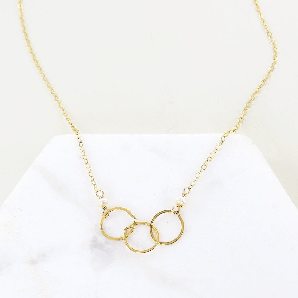 
                      
                        NKL-GF PEARL AND THREE LOOPED GOLD NECKLACE
                      
                    