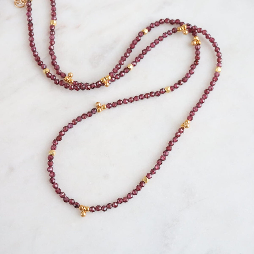 
                      
                        NKL-GF Red Garnet Tiny Gold Ball Charms Necklace
                      
                    