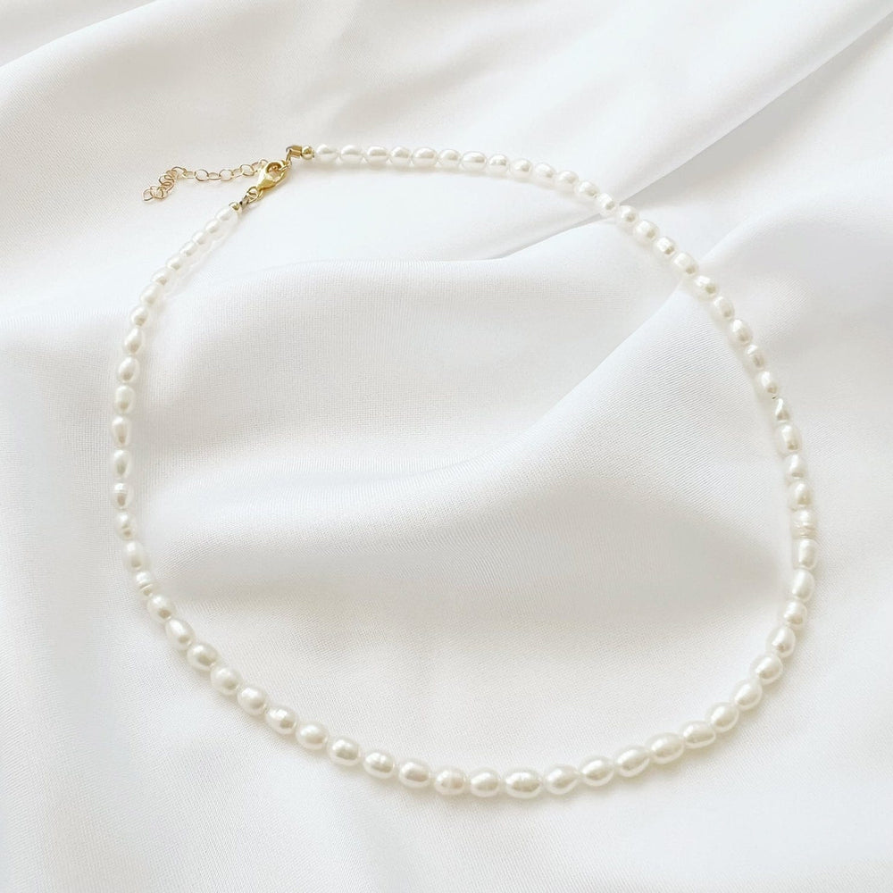 
                  
                    NKL-GF Sea Isle Freshwater Rice Pearl Beaded Necklace Gol
                  
                