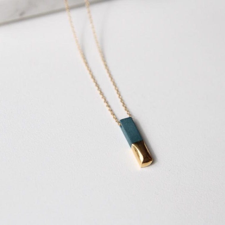 
                      
                        NKL-GF Teal Gold Dipped Bar Necklace
                      
                    