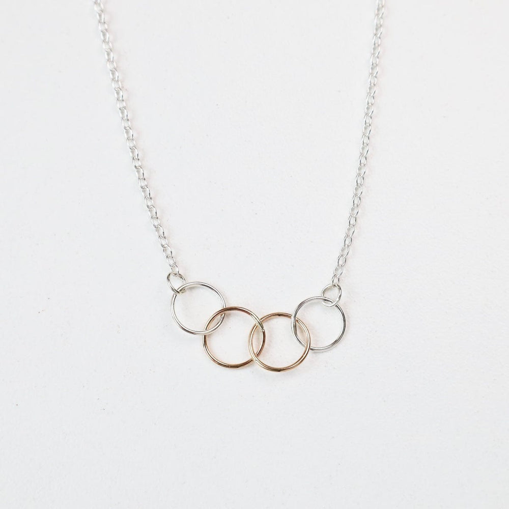 
                  
                    NKL-GF Tiny Connected Rings Necklace Two Tone
                  
                