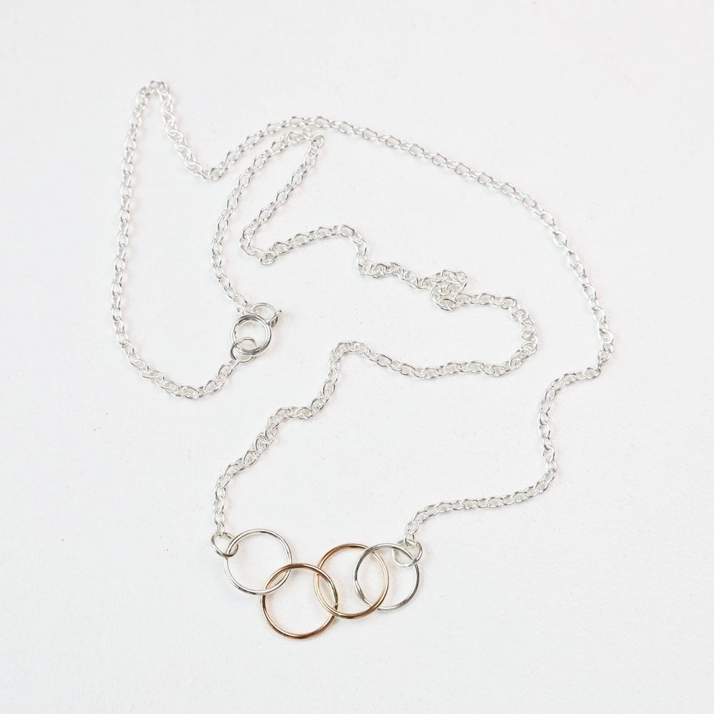 
                  
                    NKL-GF Tiny Connected Rings Necklace Two Tone
                  
                