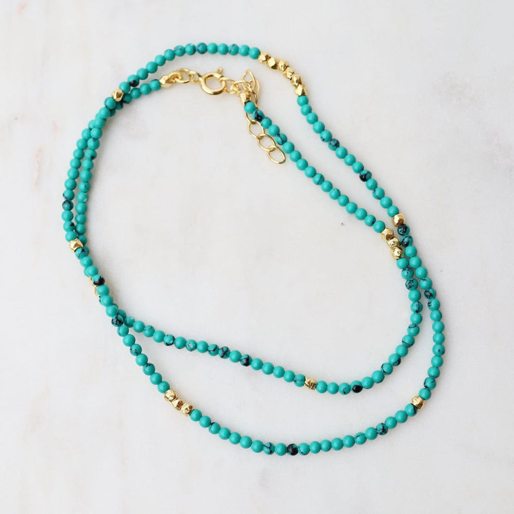 
                      
                        NKL-GF Tiny Turquoise & Gold Nugget Beaded Necklace
                      
                    