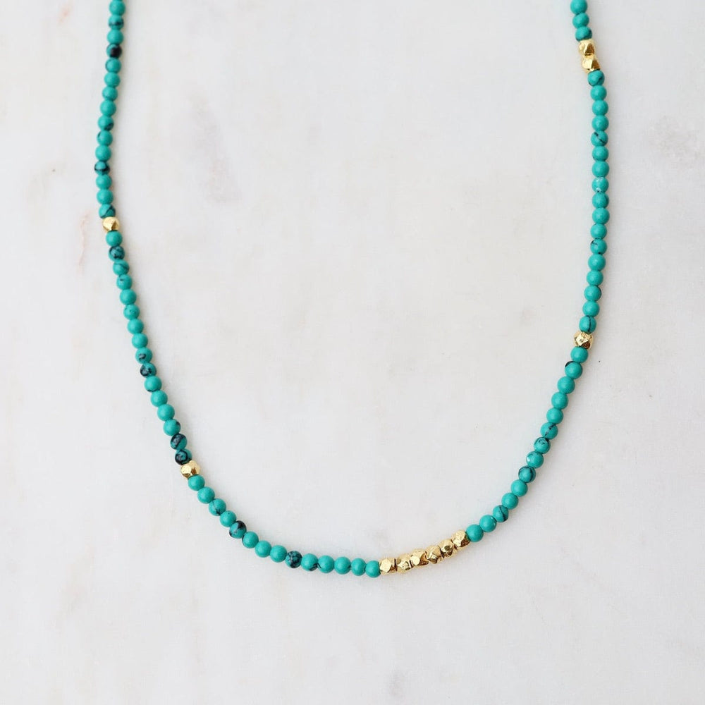 
                      
                        NKL-GF Tiny Turquoise & Gold Nugget Beaded Necklace
                      
                    