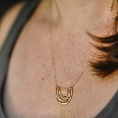 
                      
                        NKL-GF Triple Arc Necklace Gold
                      
                    