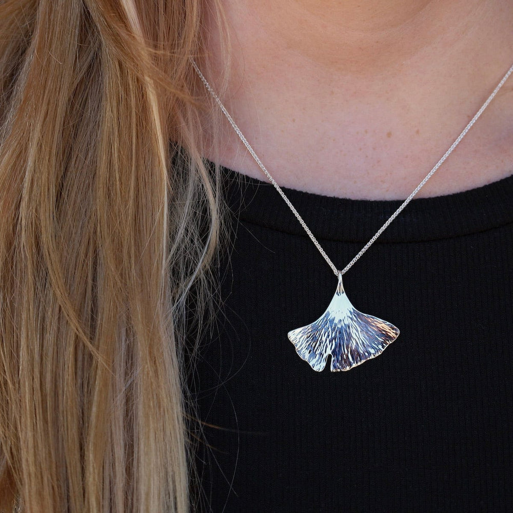 
                      
                        NKL Ginkgo Pendant Necklace
                      
                    