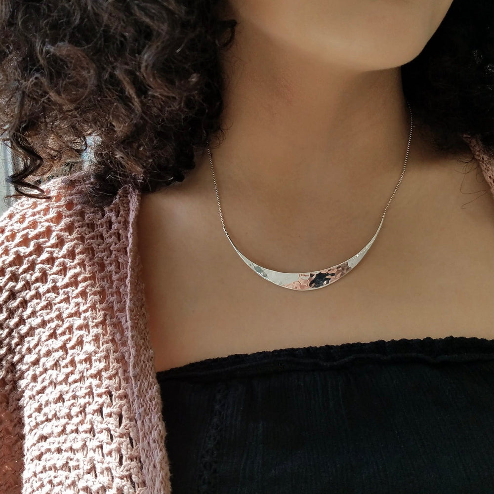 
                      
                        NKL Glimmer Necklace
                      
                    