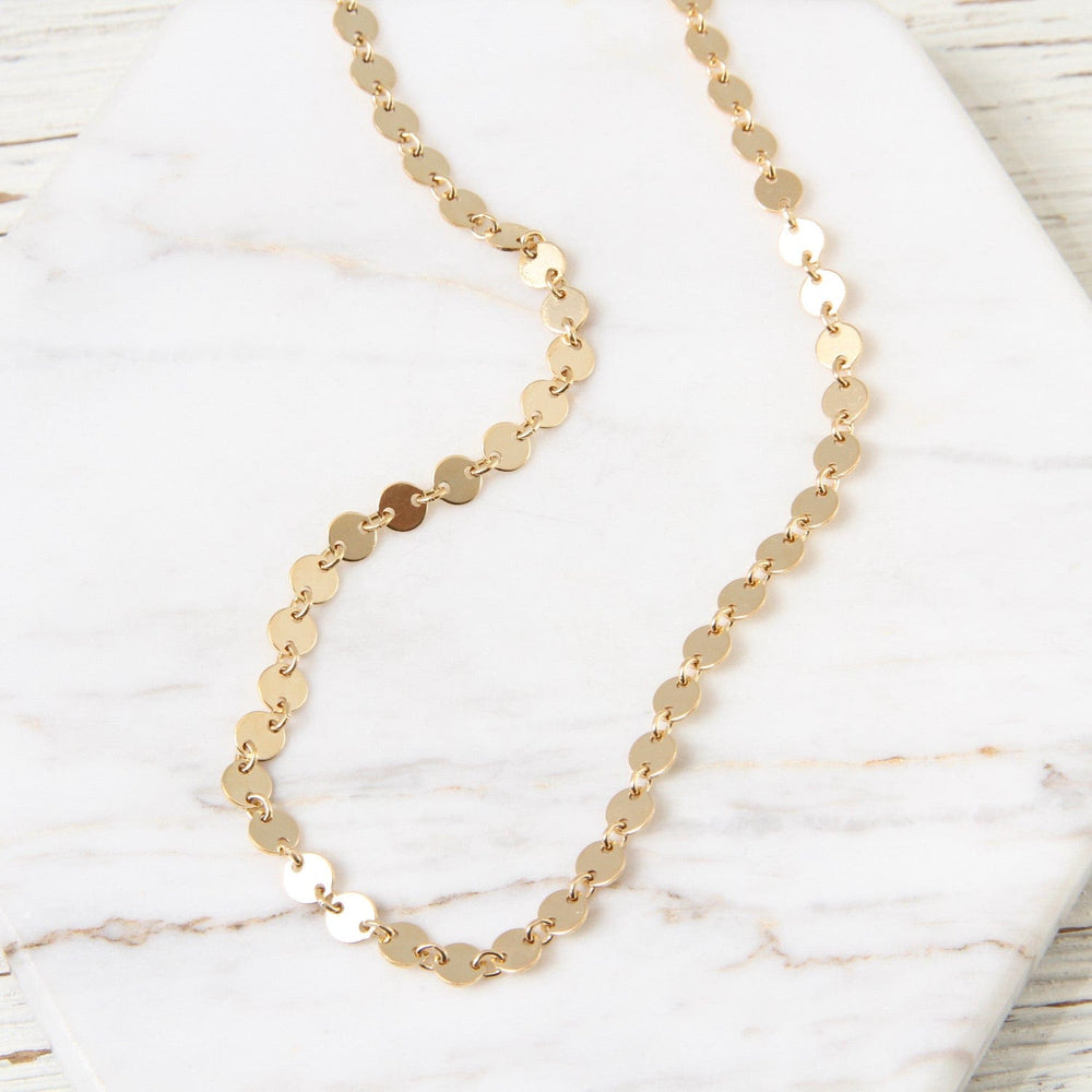 
                  
                    NKL Gold Filled Disc Choker
                  
                