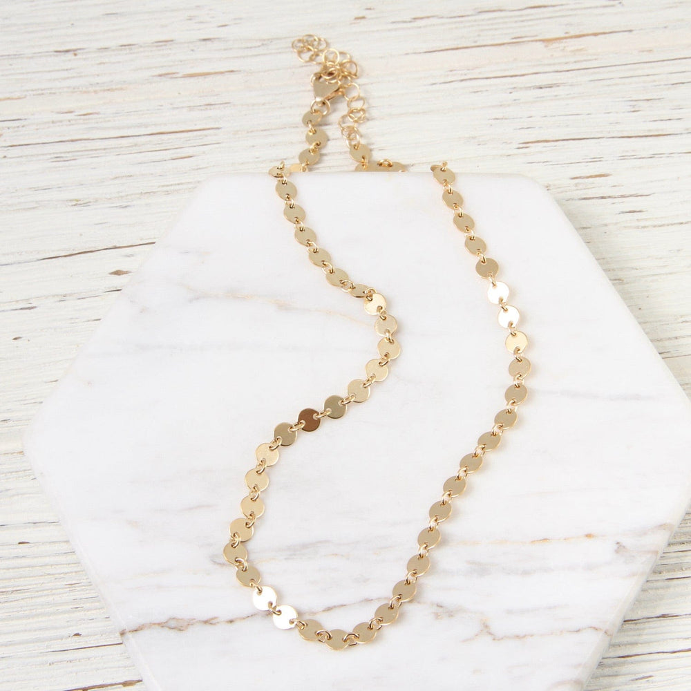 
                      
                        NKL Gold Filled Disc Choker
                      
                    