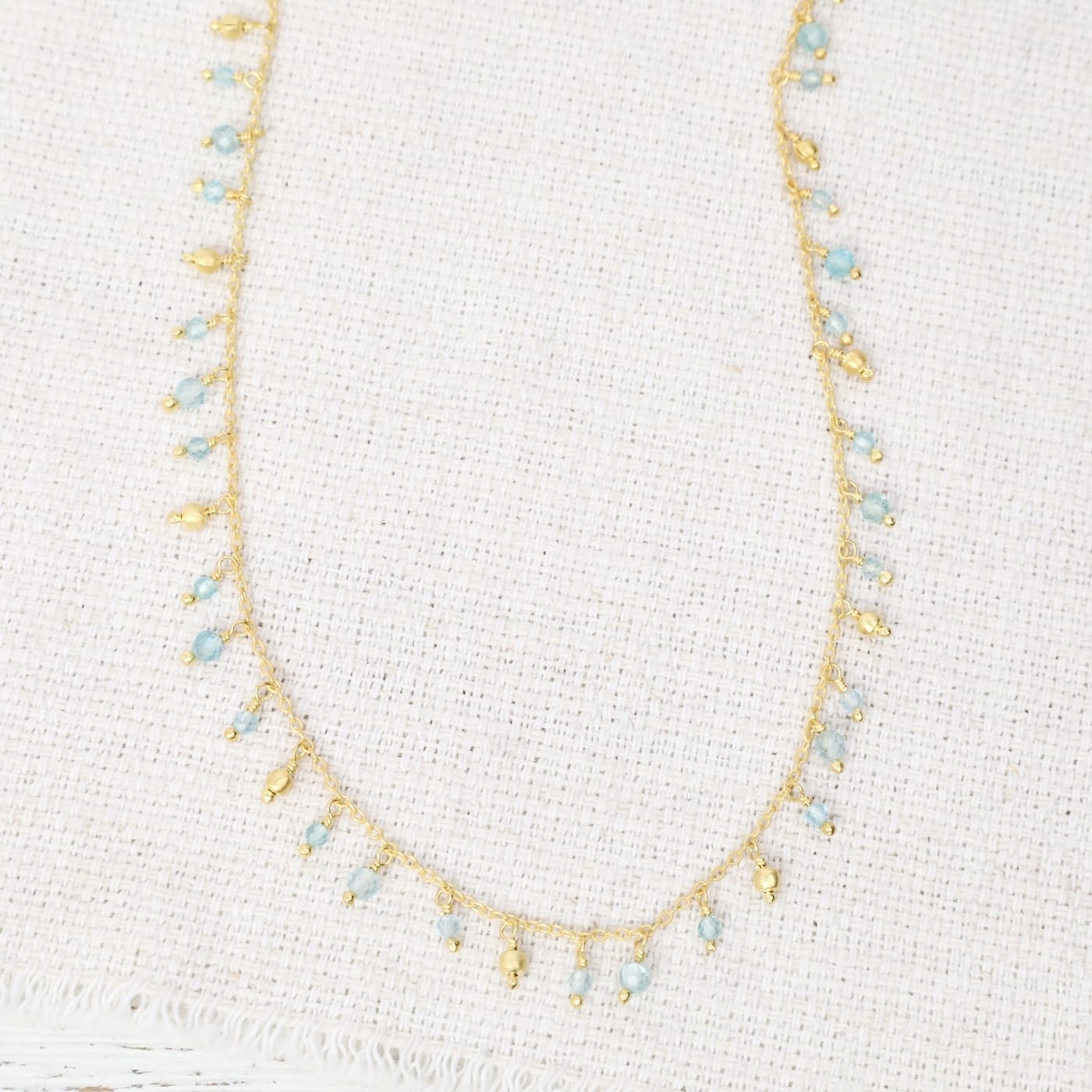 NKL-GPL Aquamarine Bead Drops on Gold Chain Nekclace