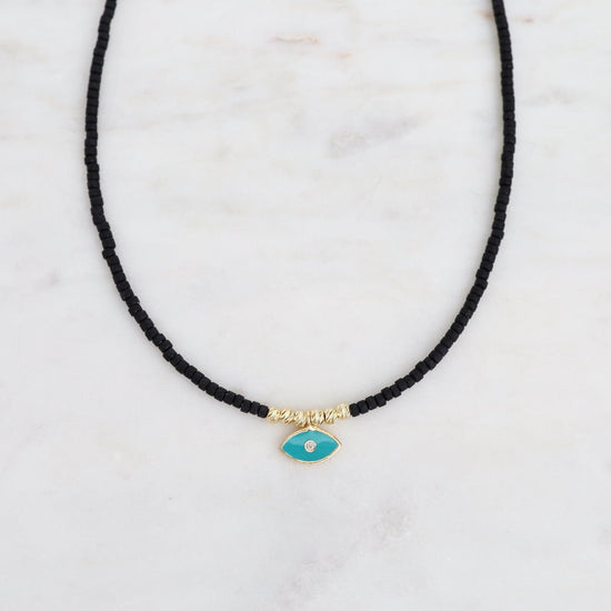 NKL-GPL Black Beaded Necklace with Horizontal Evil Eye
