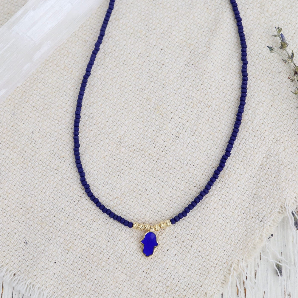 
                  
                    NKL-GPL Blue Beaded Necklace with Hamsa
                  
                