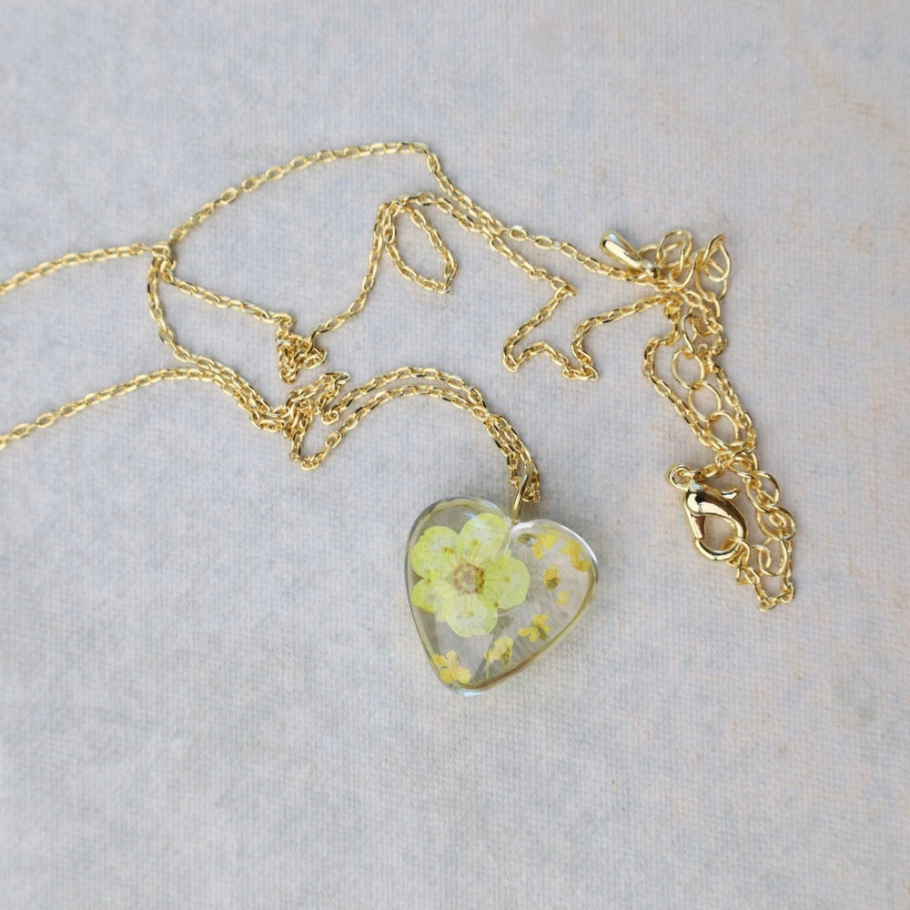 
                  
                    NKL-GPL Botanical Mini Heart Necklace - Yellow Corn Poppy Gladiolus August Birthday
                  
                