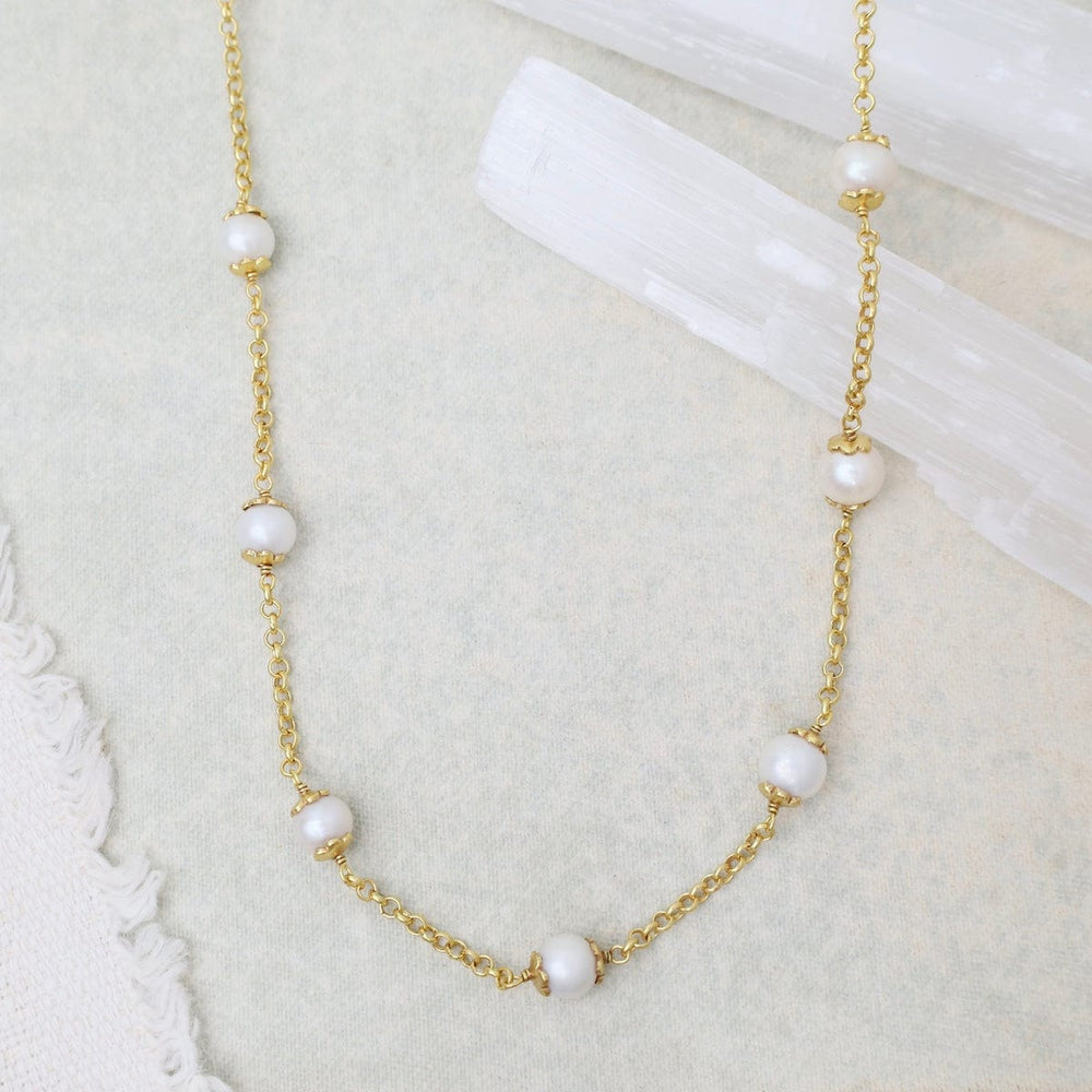 
                      
                        NKL-GPL Capped Pearls Station Necklace
                      
                    