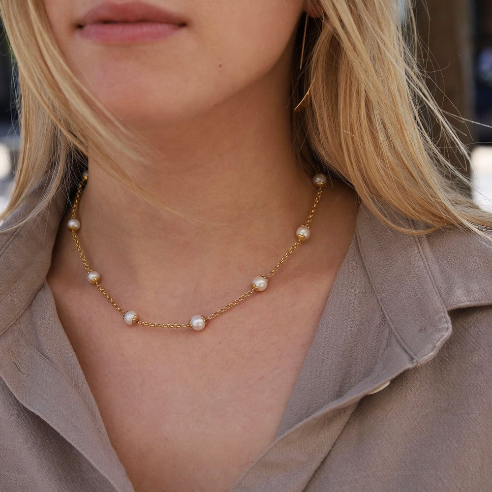 
                      
                        NKL-GPL Capped Pearls Station Necklace
                      
                    