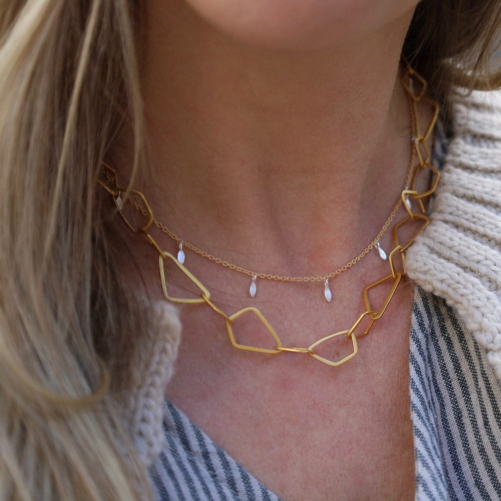 
                      
                        NKL-GPL Gold Chain with Silver Leaves Necklace
                      
                    