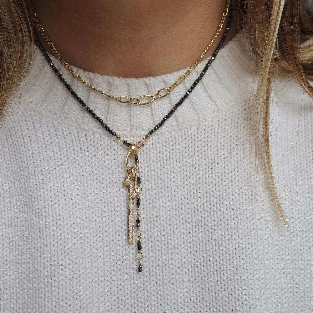 
                      
                        NKL-GPL Gold Figaro Chain Necklace
                      
                    