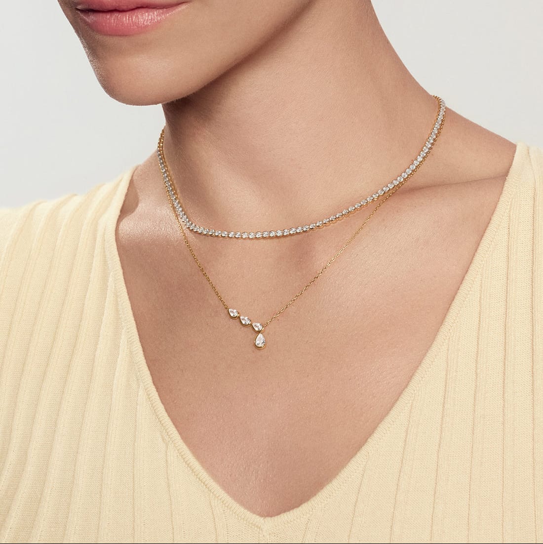 NKL-GPL Gold Half Bezel Angled & Dangle Teardrop Necklace