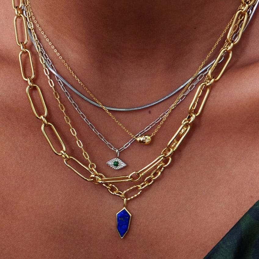 
                      
                        NKL-GPL Gold Lapis Emblem Pendant Necklace
                      
                    