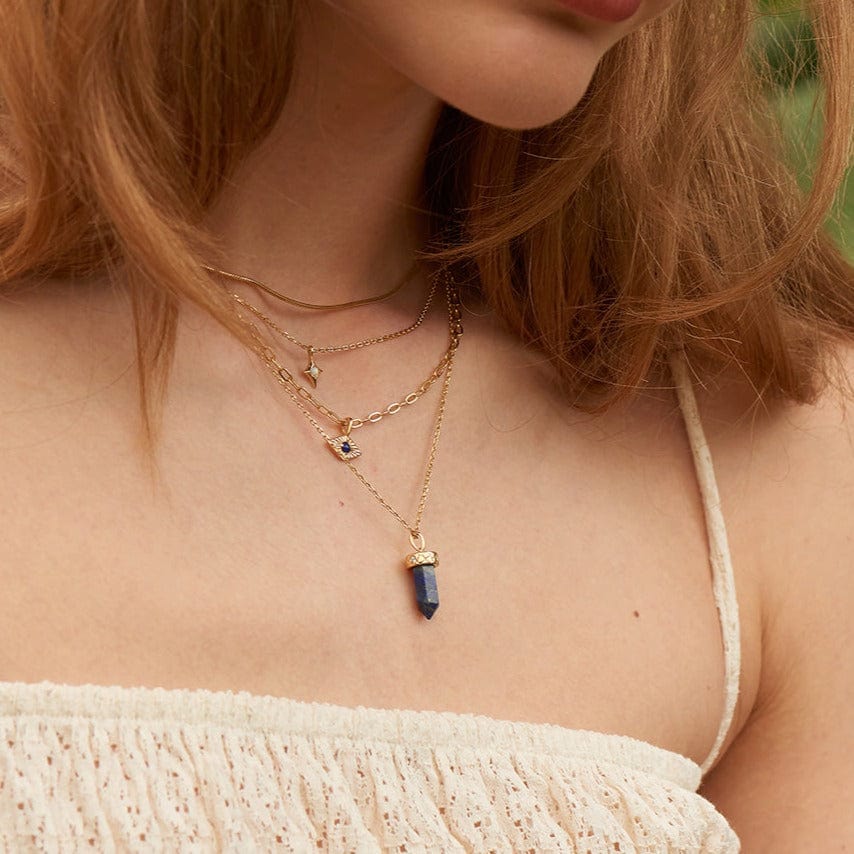 
                      
                        NKL-GPL Gold Lapis Point Pendant Necklace
                      
                    