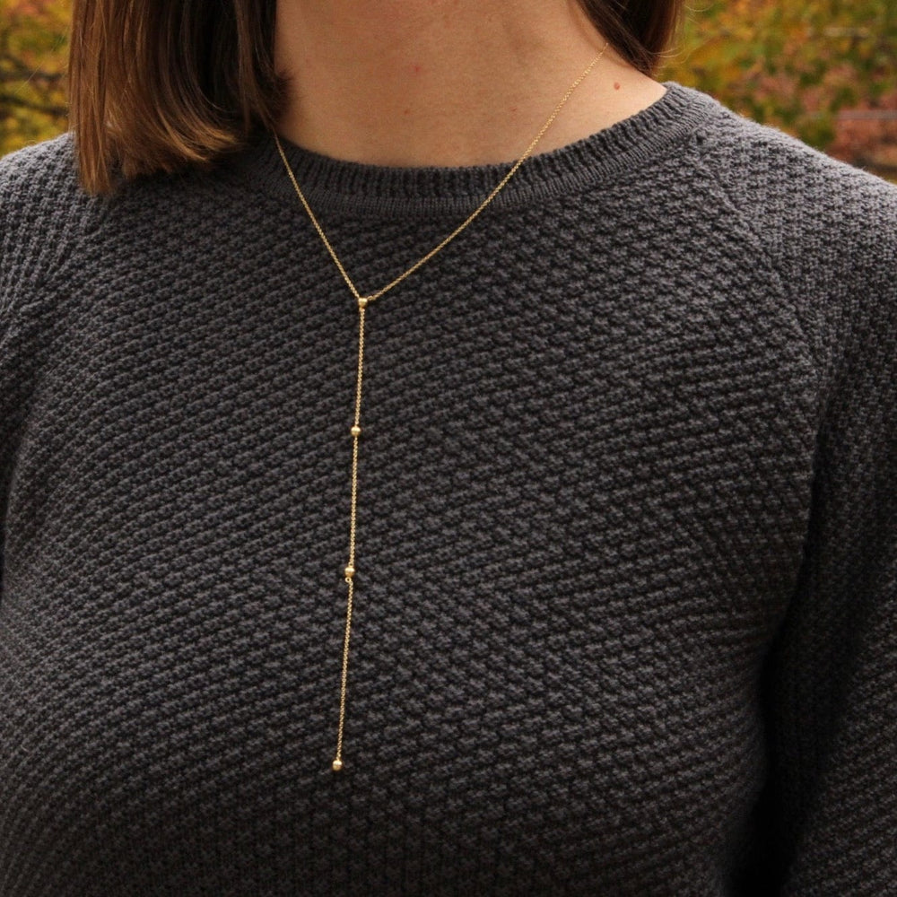 
                      
                        NKL-GPL Gold Modern Beaded Y Necklace
                      
                    