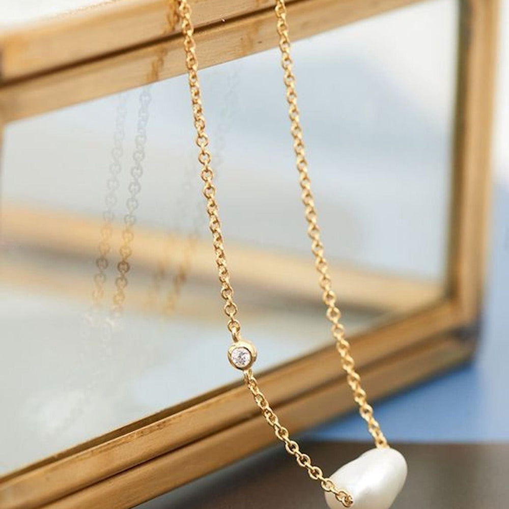 
                      
                        NKL-GPL Gold Pearl Necklace
                      
                    